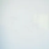 Close-up of scratches on a white refrigerator door