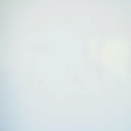 Close-up of scratches on a white refrigerator door