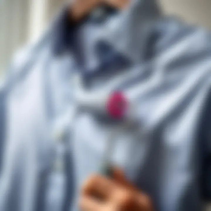 Using a Lint Roller on a Garment A lint roller being used on a shirt.