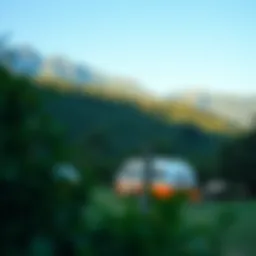 A serene campsite surrounded by lush greenery and mountains