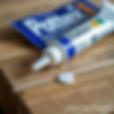 Close-up of Pattex adhesive on a wooden surface